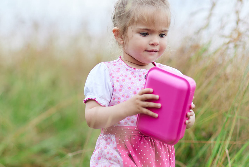 Kind mit Emil Lunchbox